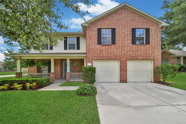 view of front of home featuring driveway, brick siding, covered porch, and a front lawn