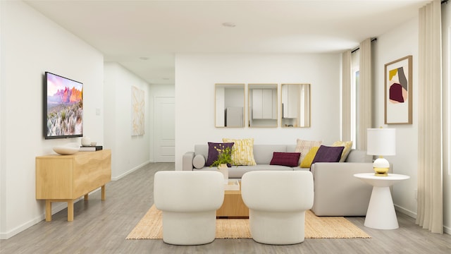 living room with baseboards and wood finished floors