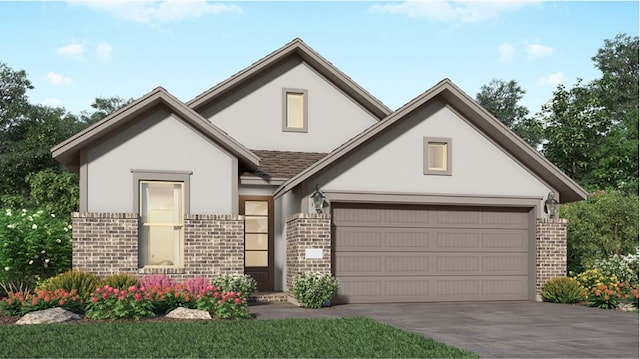 view of front of home featuring concrete driveway, an attached garage, brick siding, and stucco siding