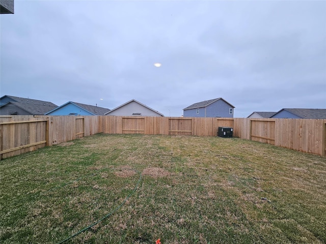 view of yard featuring a fenced backyard