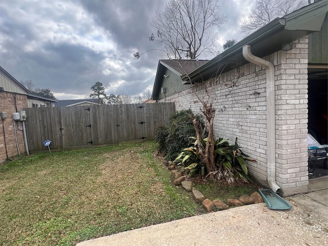 view of yard with fence