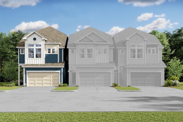 view of front of property with a garage, concrete driveway, and board and batten siding