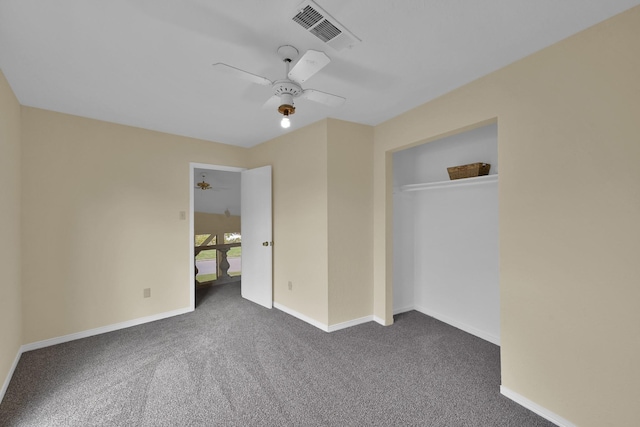 unfurnished bedroom featuring a ceiling fan, baseboards, visible vents, a closet, and dark carpet