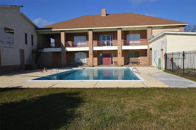 view of pool featuring a fenced in pool, a patio, stairs, and fence