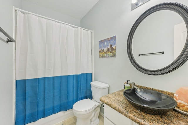 full bathroom with vanity, shower / bath combination with curtain, and toilet