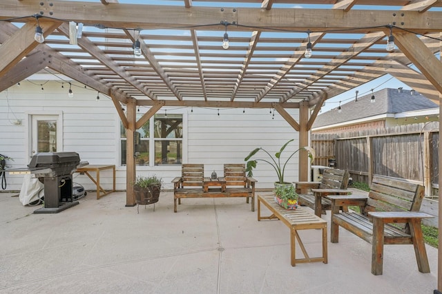 view of patio / terrace featuring grilling area, a pergola, and fence