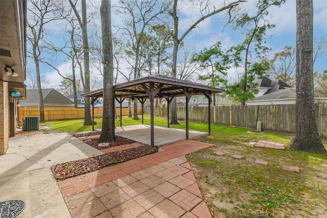 view of patio / terrace with a gazebo, central AC unit, and a fenced backyard