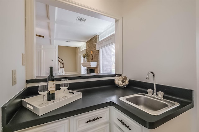 bathroom with visible vents and vanity