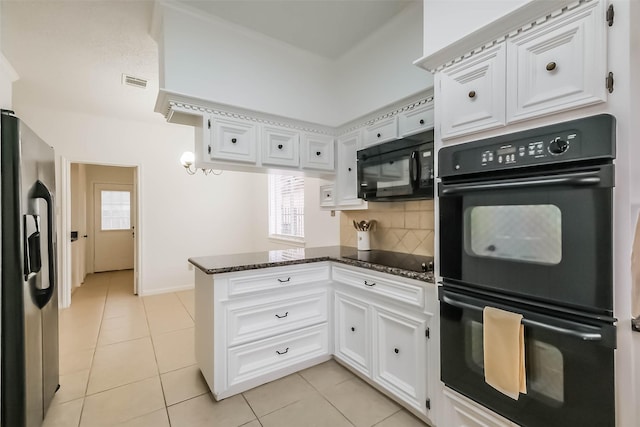 kitchen featuring black appliances, backsplash, white cabinetry, a peninsula, and light tile patterned floors