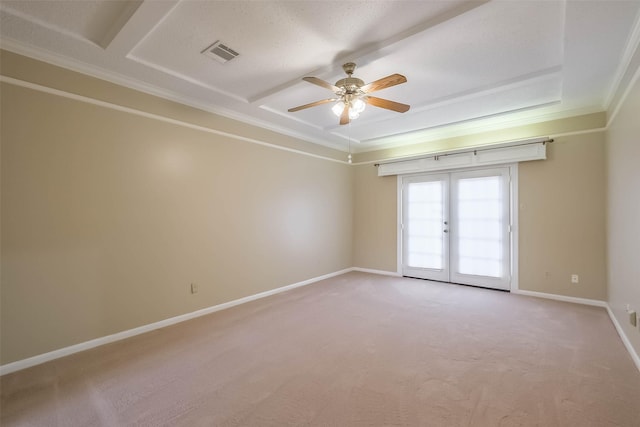 unfurnished room featuring visible vents, ceiling fan, baseboards, light colored carpet, and french doors