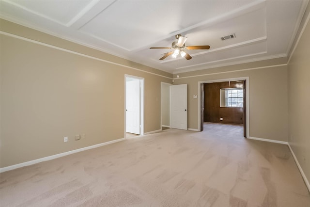 spare room with ceiling fan, baseboards, visible vents, and light carpet