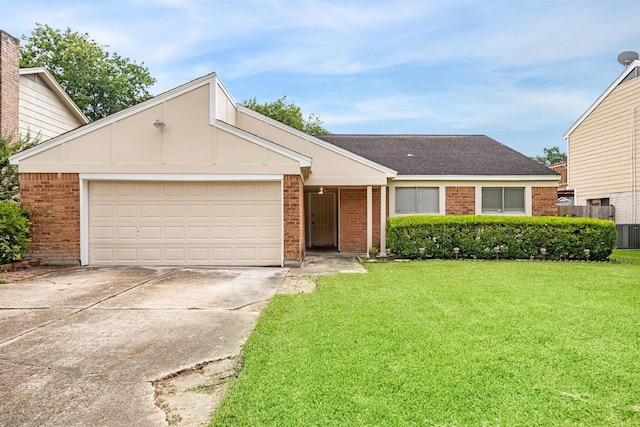 view of front of property featuring driveway, brick siding, an attached garage, and a front yard