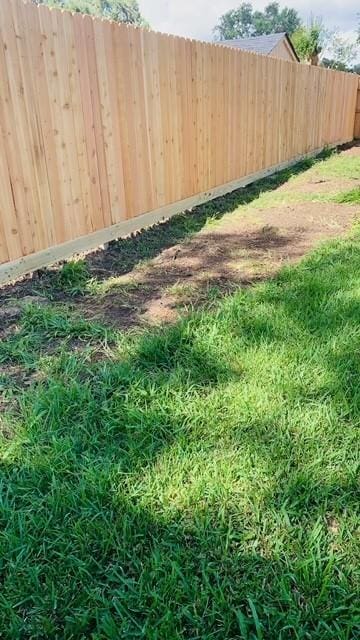 view of yard with fence