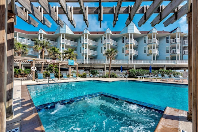 pool with a hot tub