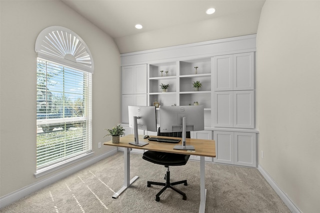 office space featuring recessed lighting, baseboards, and light colored carpet