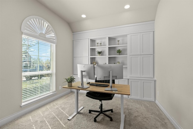 10015 Starhill Ct, Missouri City, TX 77459 - home office featuring light colored carpet, baseboards, and vaulted ceiling