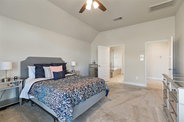 bedroom featuring visible vents, light colored carpet, baseboards, and vaulted ceiling