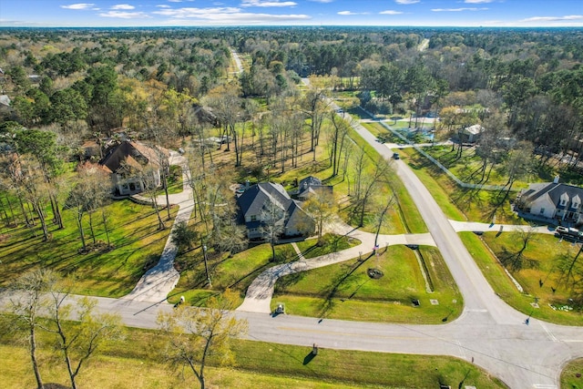 aerial view with a wooded view