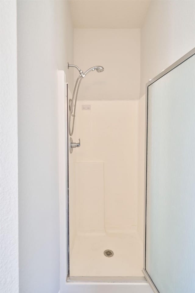 bathroom with a stall shower