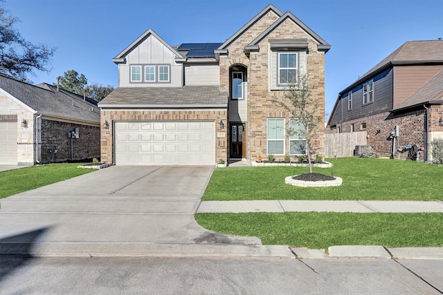 view of front of house with a front lawn, brick siding, board and batten siding, and driveway