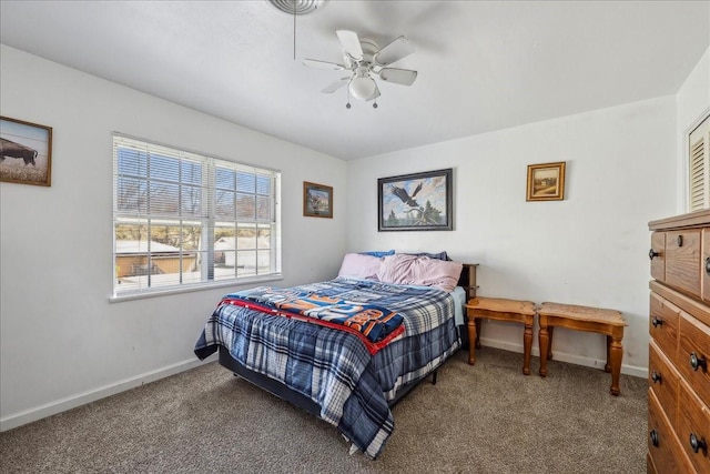 bedroom featuring a ceiling fan, baseboards, and carpet floors