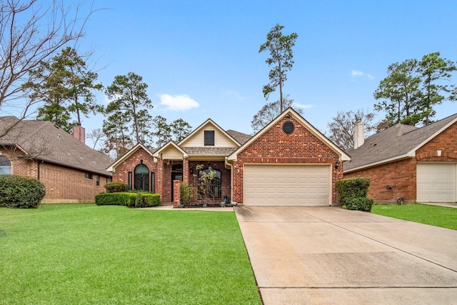 view of front of property with driveway, a front lawn, an attached garage, a shingled roof, and brick siding