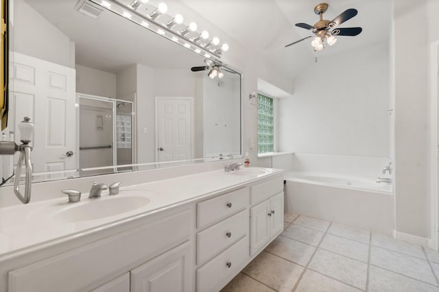 full bathroom featuring visible vents, a stall shower, a sink, tile patterned flooring, and a bath