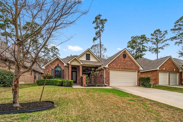 view of front of property with driveway, a front lawn, a shingled roof, a garage, and brick siding