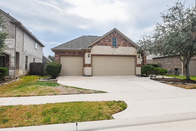 view of front facade with a garage, brick siding, driveway, and a shingled roof