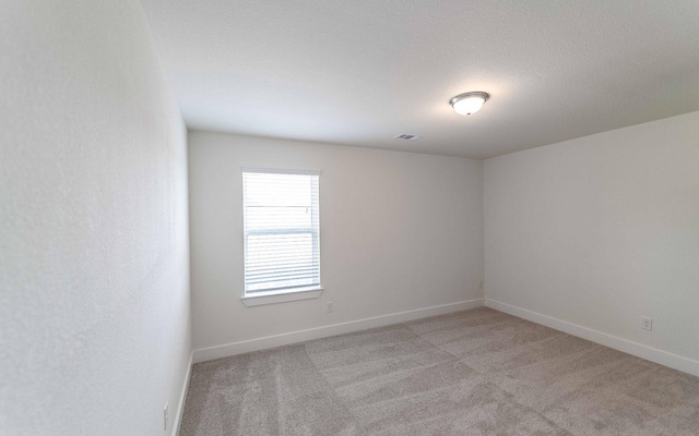 409 Twin Lakes Blvd, West Columbia, TX 77486 - unfurnished room featuring light carpet and baseboards