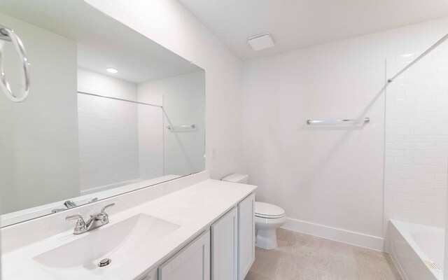 409 Twin Lakes Blvd, West Columbia, TX 77486 - full bath with vanity, toilet, baseboards, and shower / tub combination