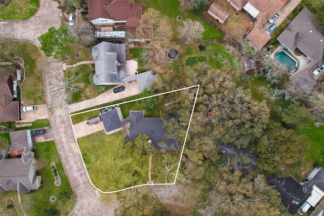 birds eye view of property with a residential view