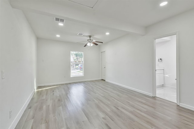 unfurnished room featuring recessed lighting, baseboards, and visible vents