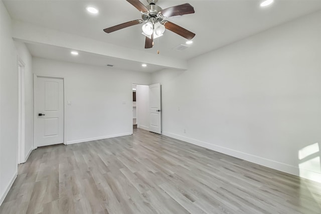 spare room featuring visible vents, baseboards, recessed lighting, ceiling fan, and light wood-style floors