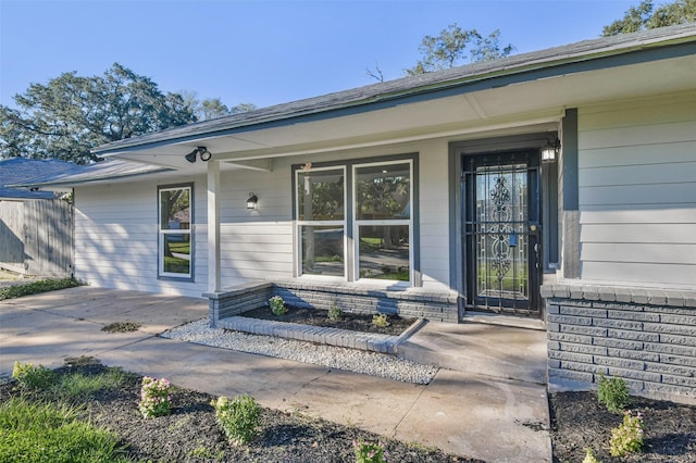 property entrance with a porch