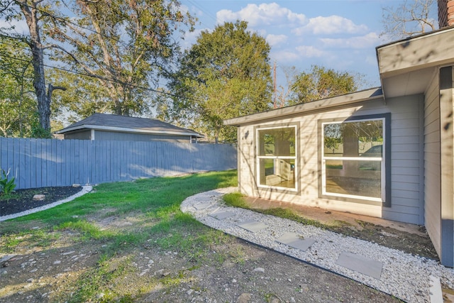 view of yard featuring fence