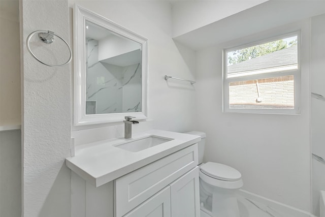 full bathroom featuring a shower, toilet, and vanity