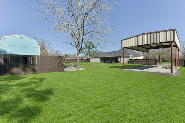 view of yard featuring a patio and a fenced backyard