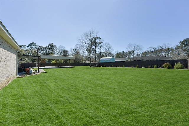 view of yard with fence