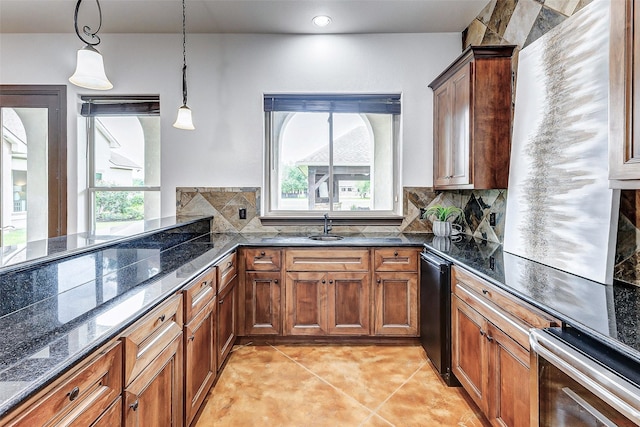 kitchen featuring light tile patterned floors, dark stone counters, pendant lighting, brown cabinets, and backsplash