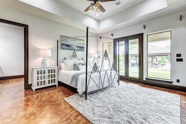 bedroom featuring visible vents, baseboards, french doors, tile patterned floors, and access to outside