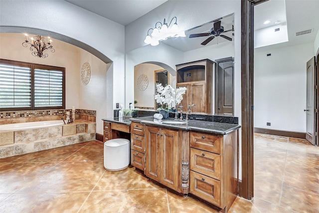 full bath with tile patterned flooring, vanity, a ceiling fan, and visible vents