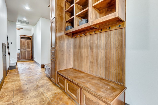 mudroom featuring baseboards and visible vents