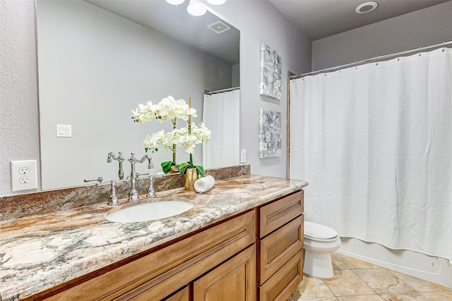 full bathroom featuring vanity, visible vents, shower / bath combo, tile patterned floors, and toilet