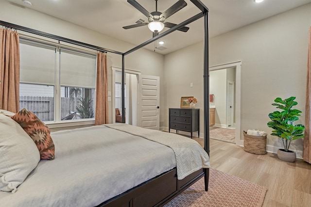 bedroom featuring ensuite bathroom, wood finished floors, recessed lighting, baseboards, and ceiling fan