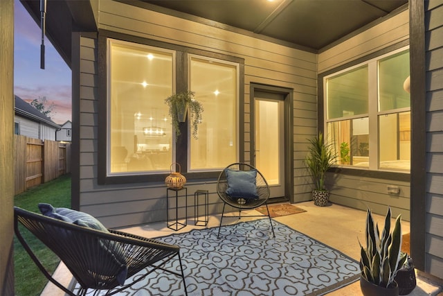 view of patio featuring fence