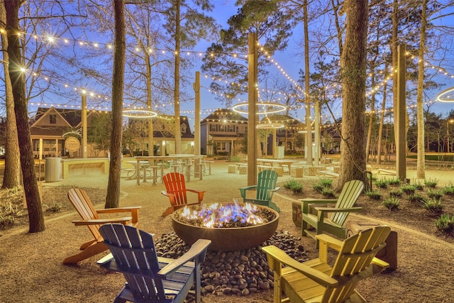 view of patio with a fire pit