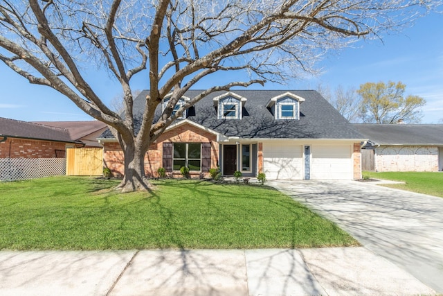 new england style home featuring a front lawn, an attached garage, driveway, and fence