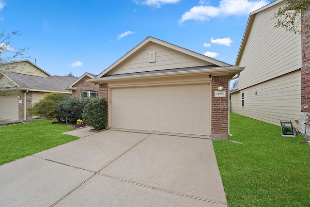 single story home with a garage, driveway, brick siding, and a front lawn