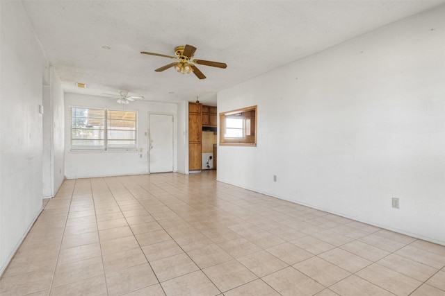 empty room featuring ceiling fan